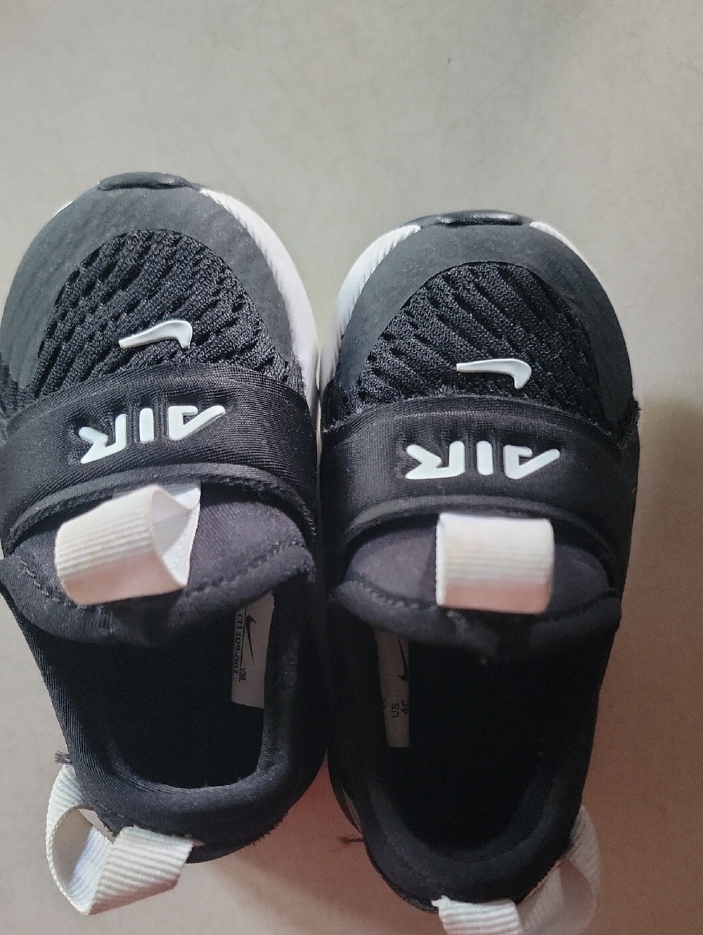 Nike Kids Black and White Slip-On Air Sneakers